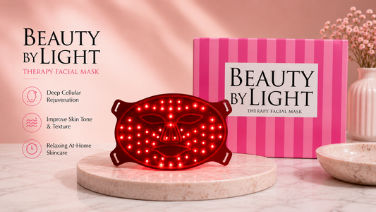Beauty by Light LED Therapy Facial Mask displayed on a marble pedestal