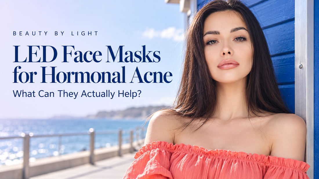 Woman in a coral off-shoulder top beside a blue seaside kiosk, with the headline “LED Face Masks for Hormonal Acne” and subtitle “What Can They Actually Help?”