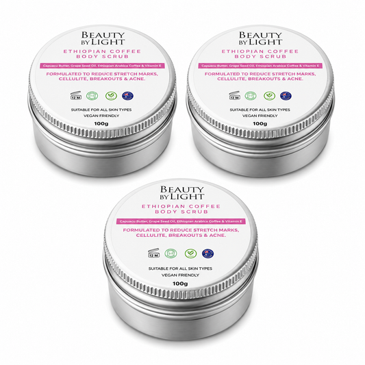 Three containers of Beauty by Light Ethiopian Coffee Body Scrub on a white background Beauty By Light Ethiopian Coffee Body Scrub 3 pack
